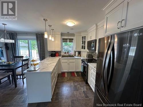 55 Duncan Street, Tide Head, NB - Indoor Photo Showing Kitchen With Double Sink With Upgraded Kitchen