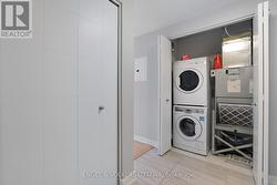 Laundry Tucked away at entry - 