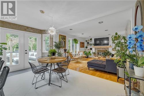 90 Southridge Road, Rothesay, NB - Indoor Photo Showing Dining Room With Fireplace