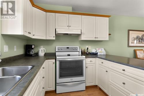 201 4525 Marigold Drive, Regina, SK - Indoor Photo Showing Kitchen With Double Sink