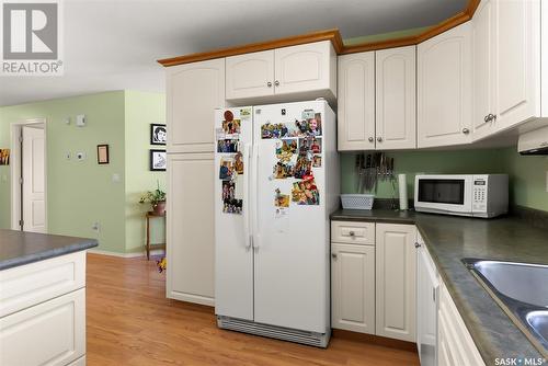 201 4525 Marigold Drive, Regina, SK - Indoor Photo Showing Kitchen With Double Sink