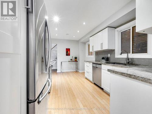 4423 Sawmill Valley Drive, Mississauga, ON - Indoor Photo Showing Kitchen With Stainless Steel Kitchen With Double Sink