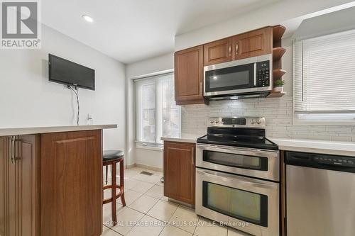 Breakfast Bar at Left - 4177 Sunflower Drive, Mississauga, ON - Indoor Photo Showing Kitchen With Stainless Steel Kitchen