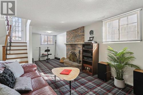 Recreation Room Adjacent to Den (not pictured) - 4177 Sunflower Drive, Mississauga, ON - Indoor Photo Showing Living Room With Fireplace