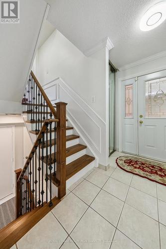 Stairs up to Primary Bedroom & Down to Garage Entr - 4177 Sunflower Drive, Mississauga, ON - Indoor Photo Showing Other Room