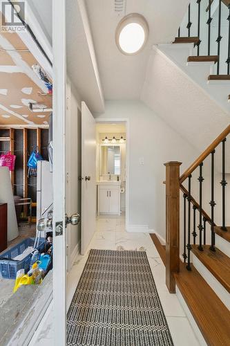 Garage Entry & View of Powder Room - 4177 Sunflower Drive, Mississauga, ON - Indoor Photo Showing Other Room