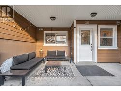 Covered Patio with BBQ area to the right of front door - 