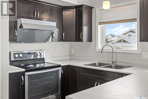 370 Kolynchuk Manor, Saskatoon, SK - Indoor Photo Showing Kitchen With Double Sink