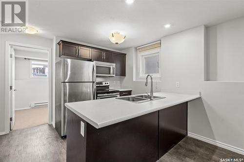 370 Kolynchuk Manor, Saskatoon, SK - Indoor Photo Showing Kitchen With Stainless Steel Kitchen With Double Sink