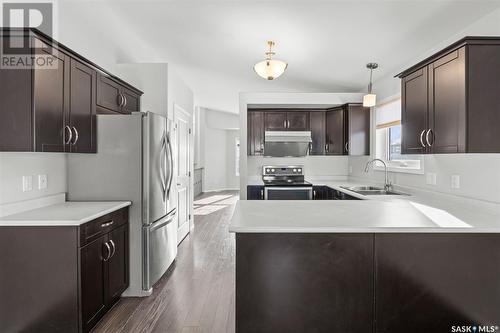 370 Kolynchuk Manor, Saskatoon, SK - Indoor Photo Showing Kitchen With Stainless Steel Kitchen With Double Sink