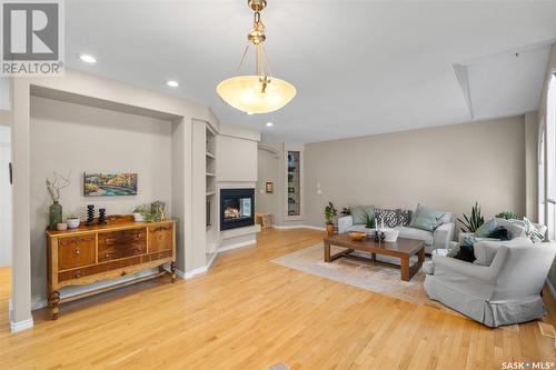 411 Collins Crescent, Saskatoon, SK - Indoor Photo Showing Living Room With Fireplace