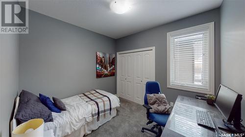 7033 Maple Fern Bay, Regina, SK - Indoor Photo Showing Bedroom