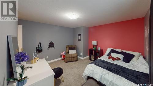 7033 Maple Fern Bay, Regina, SK - Indoor Photo Showing Bedroom