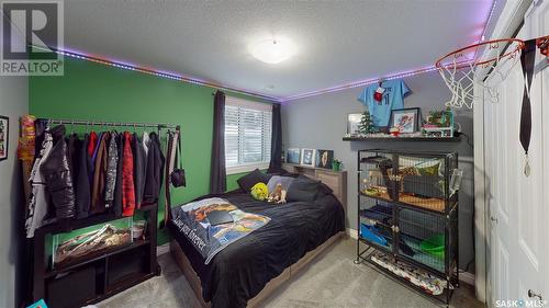 7033 Maple Fern Bay, Regina, SK - Indoor Photo Showing Bedroom