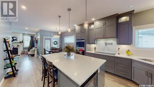 7033 Maple Fern Bay, Regina, SK - Indoor Photo Showing Kitchen With Upgraded Kitchen