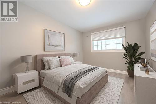 Bedroom featuring lofted ceiling and wood-type flooring - 82 Conway Drive, Kitchener, ON - Indoor Photo Showing Bedroom