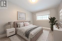 Bedroom featuring lofted ceiling and wood-type flooring - 