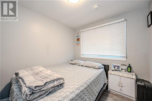 Bedroom with wood-type flooring - 82 Conway Drive, Kitchener, ON - Indoor Photo Showing Bedroom