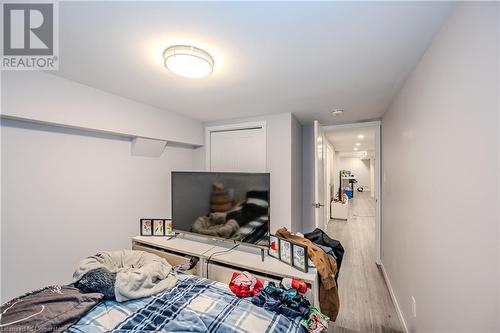 Bedroom featuring light hardwood / wood-style flooring - 82 Conway Drive, Kitchener, ON - Indoor