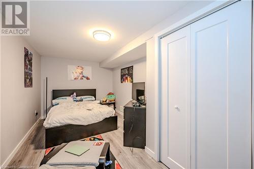 Bedroom with light hardwood / wood-style floors - 82 Conway Drive, Kitchener, ON - Indoor Photo Showing Bedroom