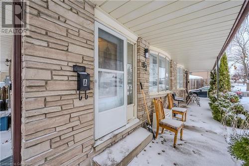 View of snow covered property entrance - 82 Conway Drive, Kitchener, ON - Outdoor With Exterior