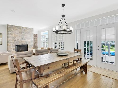 Dining room - 10 Rue Du Chevreuil, Mercier, QC - Indoor Photo Showing Dining Room With Fireplace