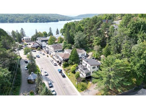 FaÃ§ade - 1926A Ch. Du Village, Mont-Tremblant, QC - Outdoor With Body Of Water With View