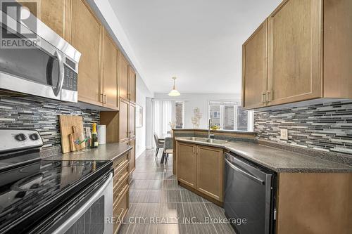 24 Pendulum Circle, Brampton, ON - Indoor Photo Showing Kitchen With Stainless Steel Kitchen With Double Sink