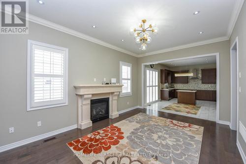 8 Fanning Trail, Brampton, ON - Indoor Photo Showing Living Room With Fireplace