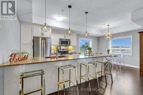 110 - 8475 Wyandotte Street E, Windsor, ON - Indoor Photo Showing Kitchen With Stainless Steel Kitchen With Upgraded Kitchen