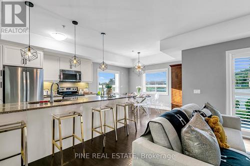 110 - 8475 Wyandotte Street E, Windsor, ON - Indoor Photo Showing Kitchen With Stainless Steel Kitchen With Upgraded Kitchen