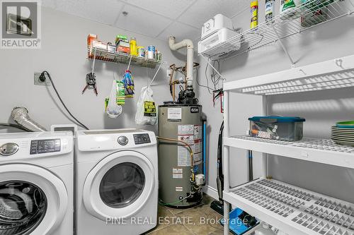 110 - 8475 Wyandotte Street E, Windsor, ON - Indoor Photo Showing Laundry Room