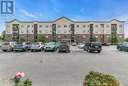 110 - 8475 Wyandotte Street E, Windsor, ON - Outdoor With Balcony With Facade