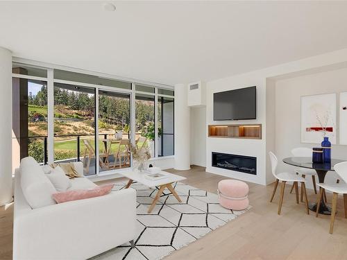 715-2000 Hannington Rd, Langford, BC - Indoor Photo Showing Living Room With Fireplace