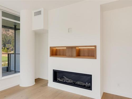 715-2000 Hannington Rd, Langford, BC - Indoor Photo Showing Living Room With Fireplace