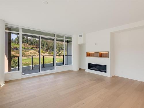 715-2000 Hannington Rd, Langford, BC - Indoor Photo Showing Living Room With Fireplace