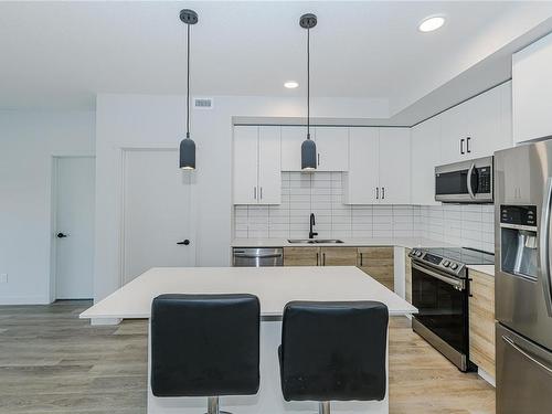 202-2469 Gateway Rd, Langford, BC - Indoor Photo Showing Kitchen With Double Sink With Upgraded Kitchen