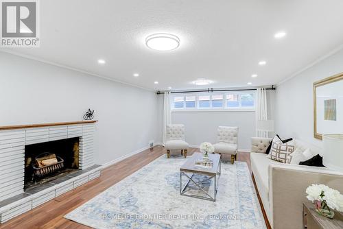 26 Flaremore Crescent, Toronto, ON - Indoor Photo Showing Living Room With Fireplace