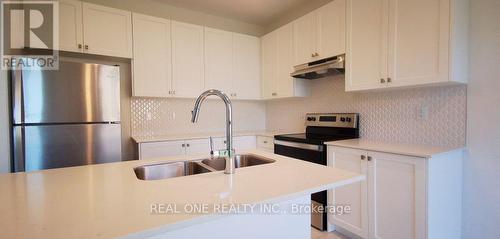 Upper - 3 Angelfish Road, Brampton, ON - Indoor Photo Showing Kitchen With Double Sink With Upgraded Kitchen