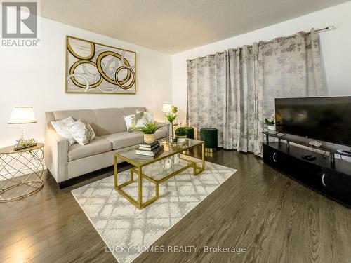 65 - 91 Muir Drive, Toronto, ON - Indoor Photo Showing Living Room