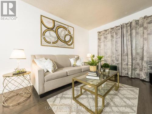 65 - 91 Muir Drive, Toronto, ON - Indoor Photo Showing Living Room