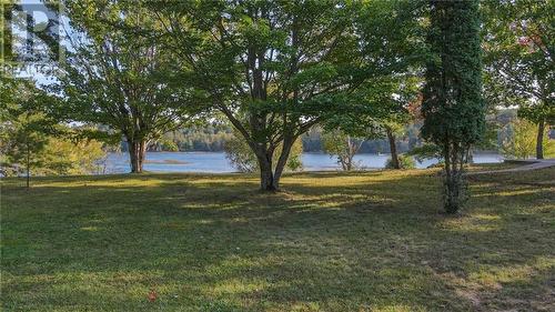 885 Gunns Road, Round Lake Centre, ON - Outdoor With Body Of Water With View