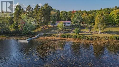 885 Gunns Road, Round Lake Centre, ON - Outdoor With Body Of Water With View