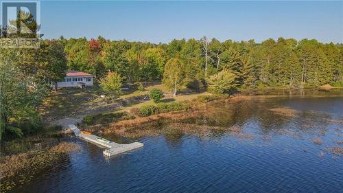 885 Gunns Road, Round Lake Centre, ON - Outdoor With Body Of Water With View