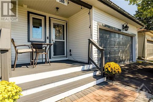 Spacious freshly painted front deck for enjoying your mornning coffee. - 165 Crampton Drive, Carleton Place, ON - Outdoor With Deck Patio Veranda With Exterior