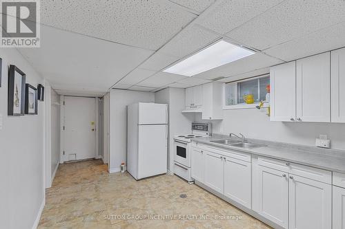 12 Roslyn Road, Barrie, ON - Indoor Photo Showing Kitchen With Double Sink