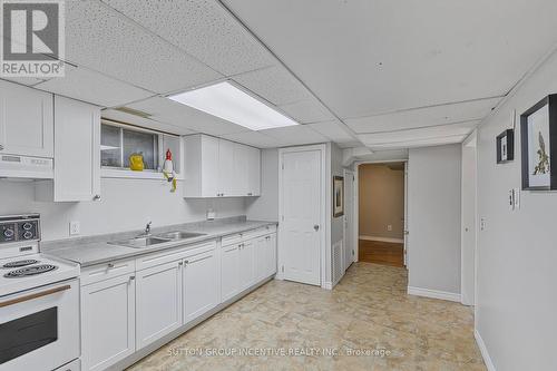 12 Roslyn Road, Barrie, ON - Indoor Photo Showing Kitchen With Double Sink