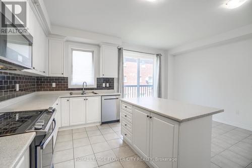 10 Faye Street, Brampton, ON - Indoor Photo Showing Kitchen With Double Sink