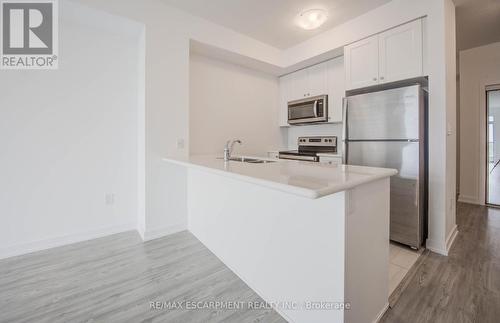 715 - 450 Dundas Street E, Hamilton, ON - Indoor Photo Showing Kitchen With Double Sink