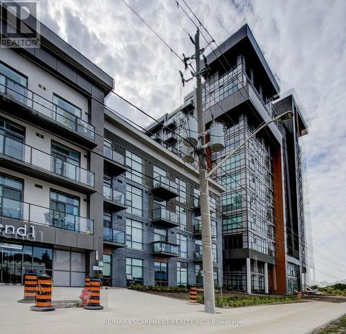 715 - 450 Dundas Street E, Hamilton, ON - Outdoor With Balcony With Facade